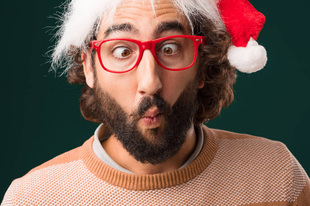 young crazy man with Christmas concept - Foto, afbeelding