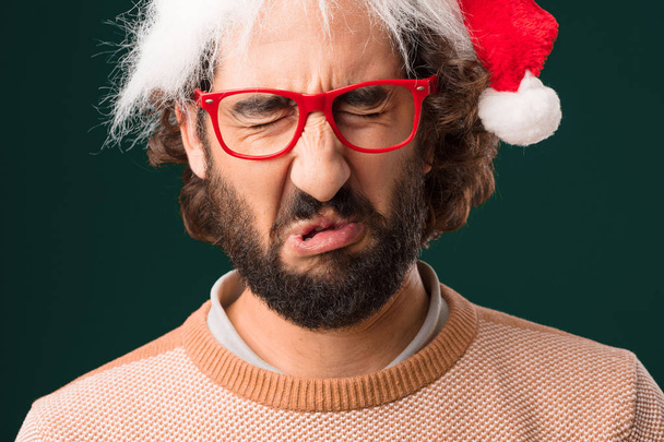 young crazy man with Christmas concept - Foto, imagen