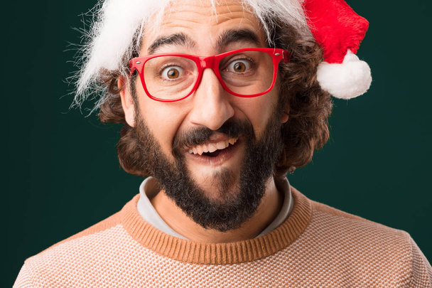 young crazy man with Christmas concept - Фото, изображение