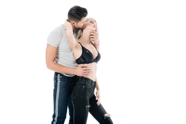 young heterosexual couple passionately hugging isolated on white - Fotoğraf, Görsel
