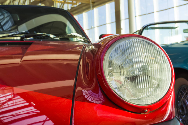 Round headlights of the sports car. - Photo, Image