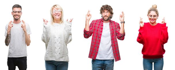 Collage van groep jongeren over witte geïsoleerde achtergrond glimlachend kruising vingers met de ogen gesloten en hoop. Geluk en bijgelovig concept. - Foto, afbeelding