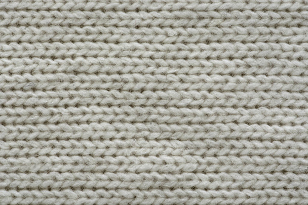Texture tricotée. Tissu motif en laine. Contexte, espace de copie. Texture pull fait main, motif en laine tricotée, fond ivoire - Photo, image
