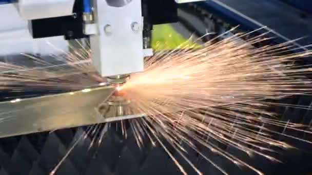 A laser beam cuts the sheet metal in the manufacture. - Footage, Video