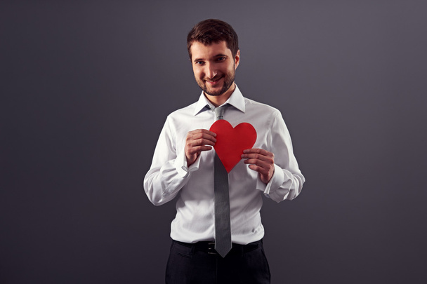 smiley man holding red heart - Foto, Imagem