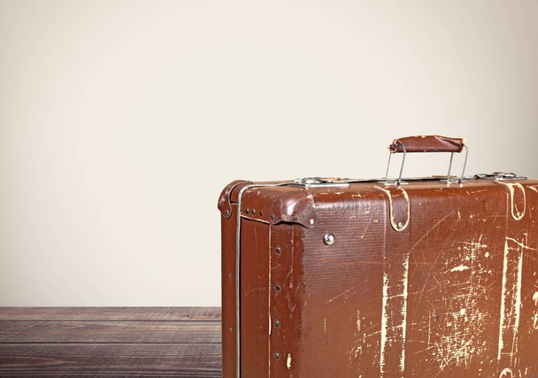 Vintage Suitcase on wooden background , travel concept - Фото, изображение