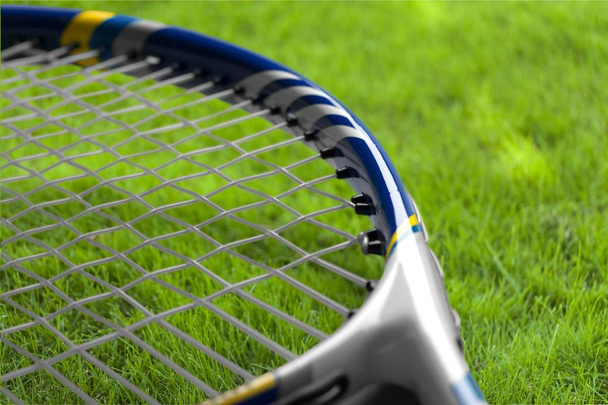 Tennis balls and racket  - Фото, изображение