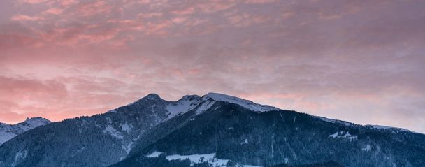 winter mountain landscape panorama at sunset with a colorful sky - Photo, Image