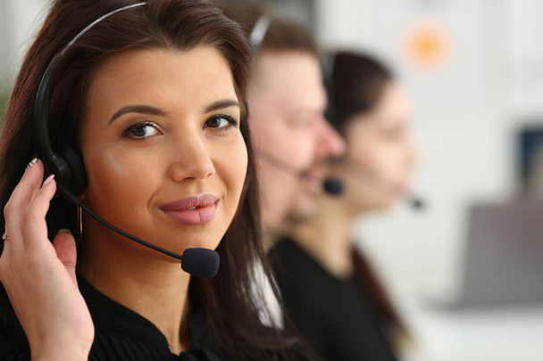 Three call centre service operators at work - Photo, Image