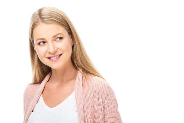 beautiful smiling blonde woman in pink cardigan isolated on white - Fotó, kép