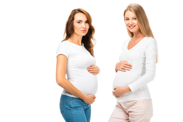 beautiful pregnant women looking at camera isolated on white - Photo, image