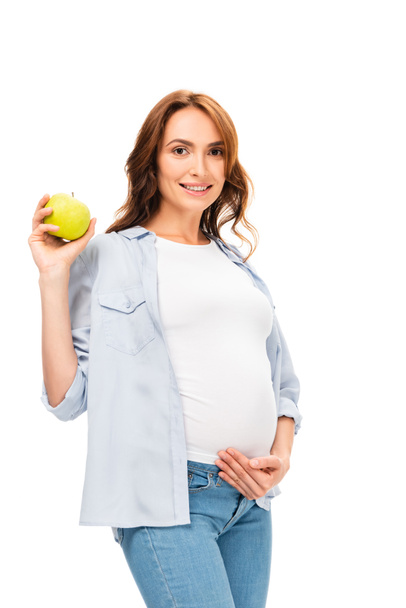 beautiful healthy mother smiling and holding green apple isolated on white - Foto, afbeelding
