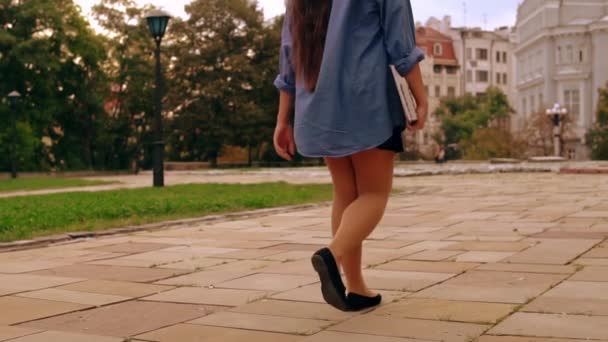 back view girl walks to class - Footage, Video