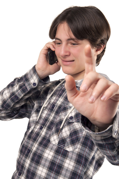 Teenage boy talking on mobile phone - Foto, Imagen