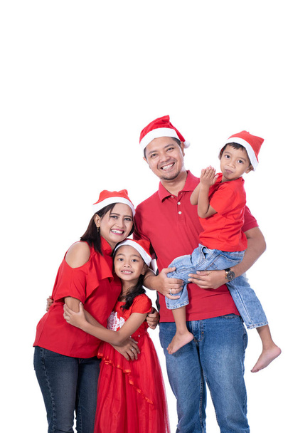 happy asian family wearing red christmas - 写真・画像