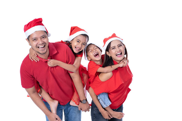 Boże Narodzenie koncepcja Azjatycka rodzina piggyback - Zdjęcie, obraz