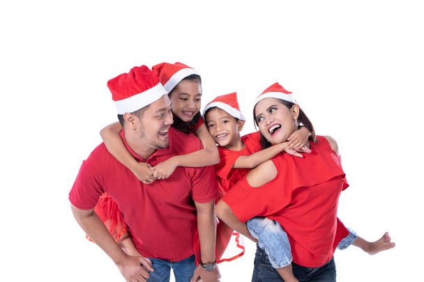 happy asian family wearing red christmas - Foto, imagen