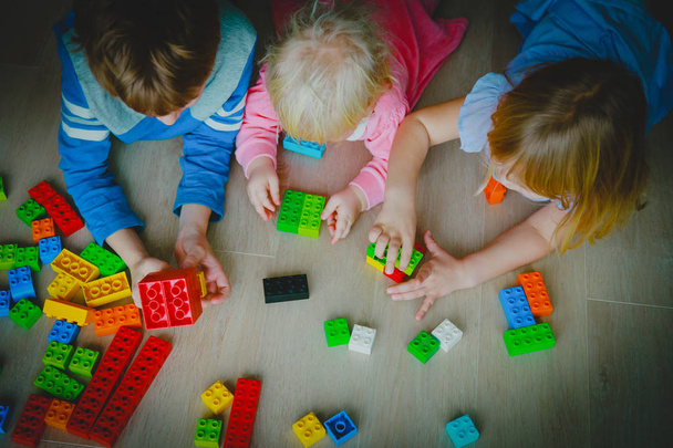 kids playing with plastic blocks, learning concept - Photo, Image