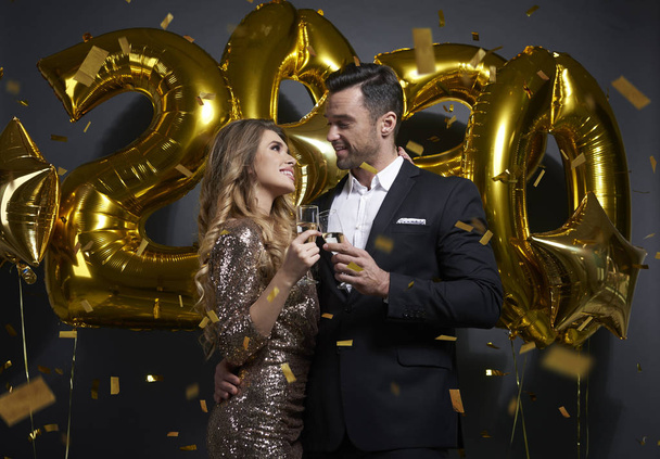 Loving couple making a toast to New Year - Photo, Image