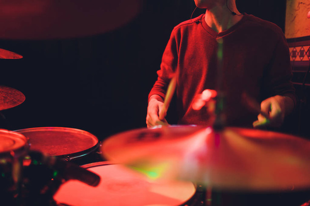 Human hands playing the drum with drumstick. - Φωτογραφία, εικόνα