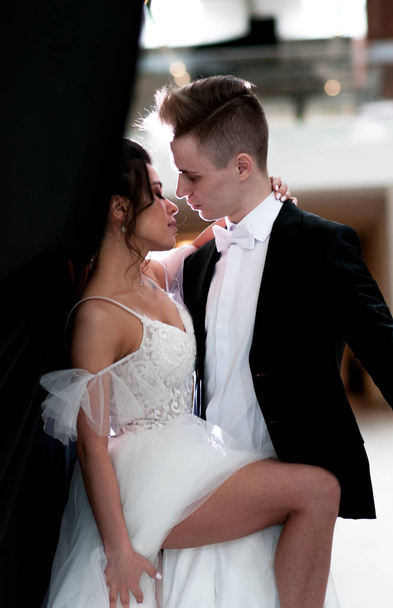 newlyweds on their wedding day in a wedding dress - Fotó, kép