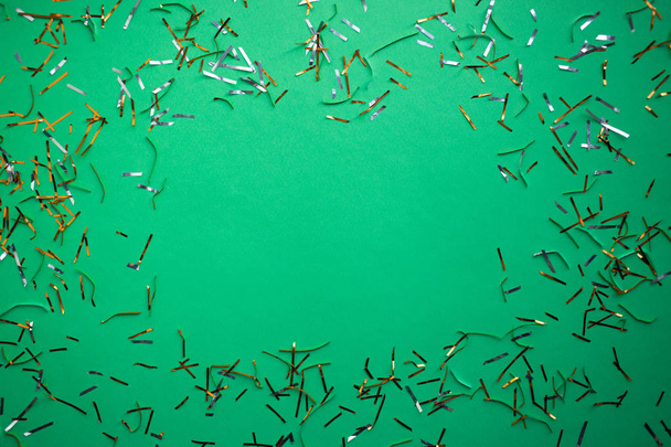 festive confetti, christmas decoration on the green background ,copy space - Zdjęcie, obraz