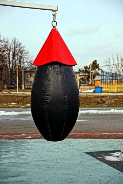 Boxing leather pear on the street near the stadium - Photo, Image
