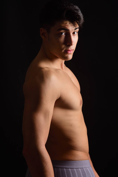 portrait of a young man undressed - Фото, зображення