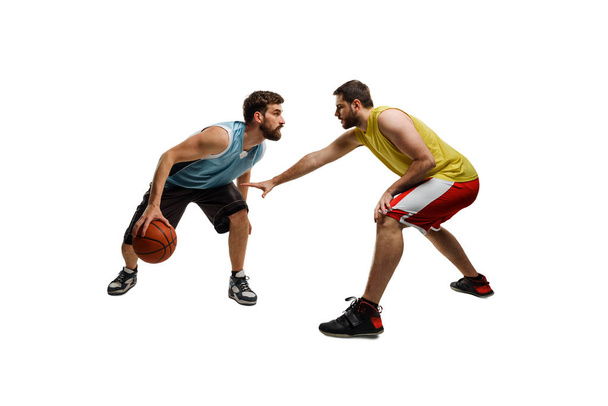 Two basketball players in action - Valokuva, kuva