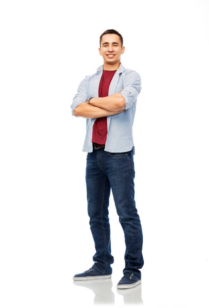 smiling young man over white background - Foto, Imagen