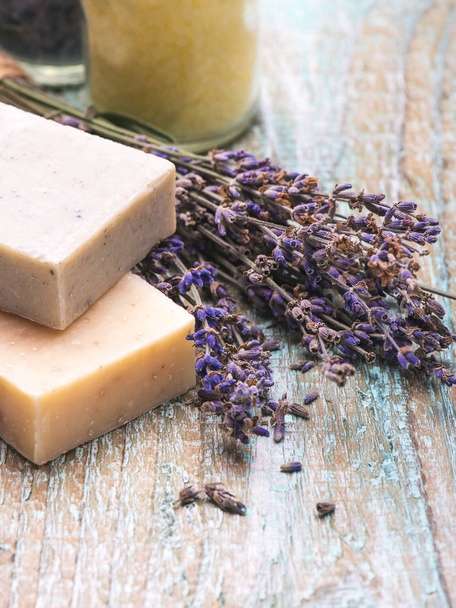 Organic natural cosmetic perfumed salt, floral soap, branch of lavender on a wooden backround with place for text. - Foto, Imagem