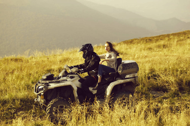Man and girl ride quad - Fotó, kép