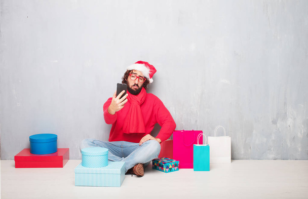 young bearded man with Christmas concept - Fotoğraf, Görsel