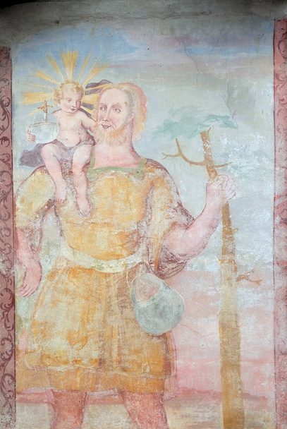Сен-Крістофер фреска на фасаді георгіївська церква у місті Luson, Італія - Фото, зображення