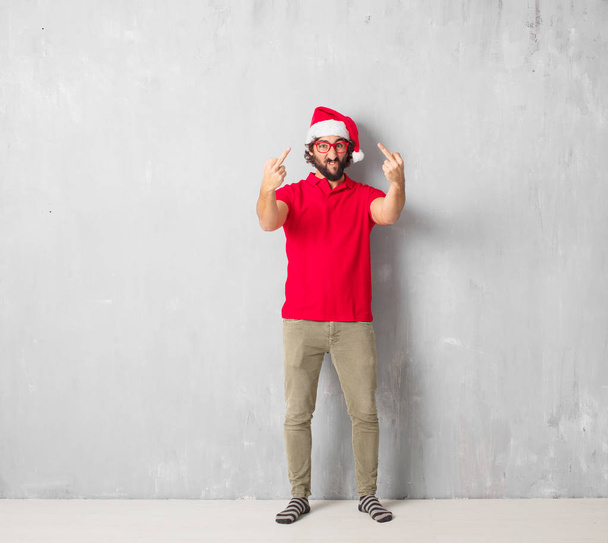 Young crazy man full body. Christmas concept. - Photo, Image