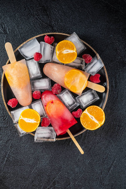 Homemade popsicles with berries and fruits,. Fruit ice cream. - Photo, Image