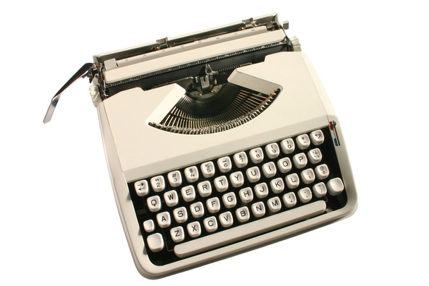 Vecchia macchina da scrivere color crema
 - Foto, immagini