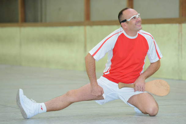 pelote basque player stretching - Foto, Imagem