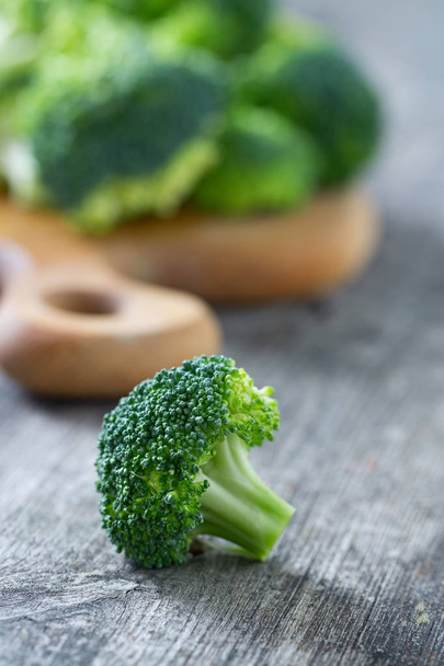 broccoli on wooden surface - Фото, зображення