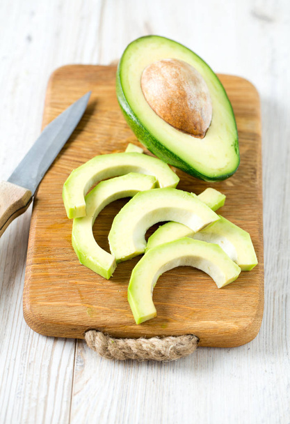 fresh sliced avocado, close up - Foto, afbeelding