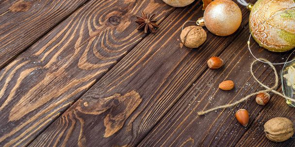 Christmas balls decor on old wood background - Foto, afbeelding
