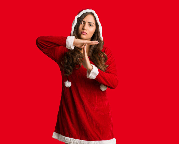 Full body young santa curvy woman doing a timeout gesture - Foto, afbeelding