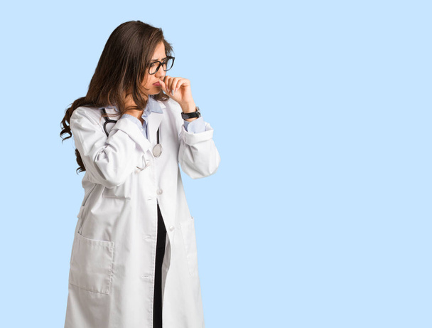 Full body young doctor woman coughing, sick due a virus or infection - 写真・画像
