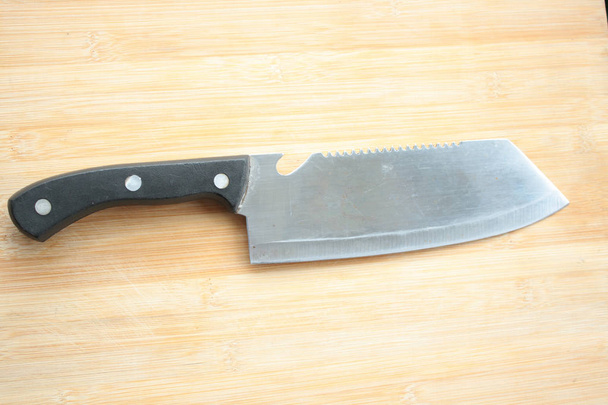 Kitchen knife on wooden background - Photo, Image