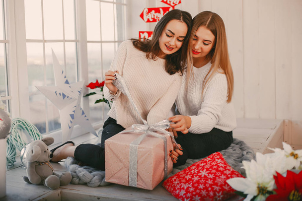 girls with gifts - 写真・画像