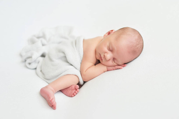 newborn boy on white background - Fotoğraf, Görsel