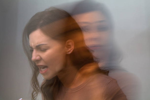 Multiple Exposure Of An Angry Woman On Grey Background - Foto, Bild
