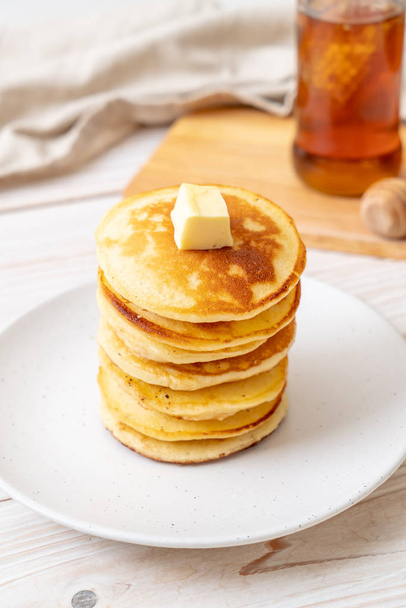 pancakes stack with butter and honey - Fotó, kép