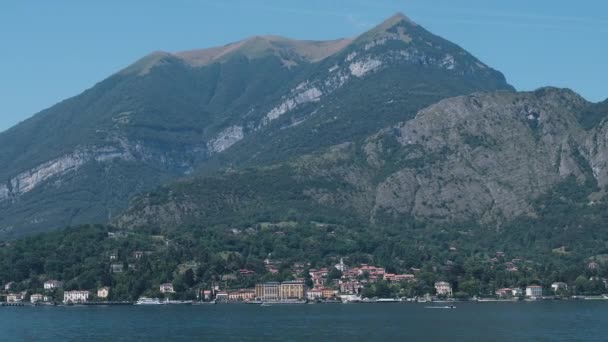 Mountains at Como Lake near Menaggio and Bellagio in Italy boats on water - Footage, Video