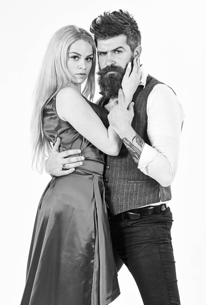 Bearded hipster and attractive lady dressed up for dancing contest. Couple in love, passionate dancers in elegant clothes, white background. Woman in red dress and man in vest. Dancing couple concept - Φωτογραφία, εικόνα